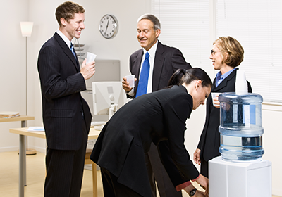 office-staff-enjoying-spring-water-from-a-cooler